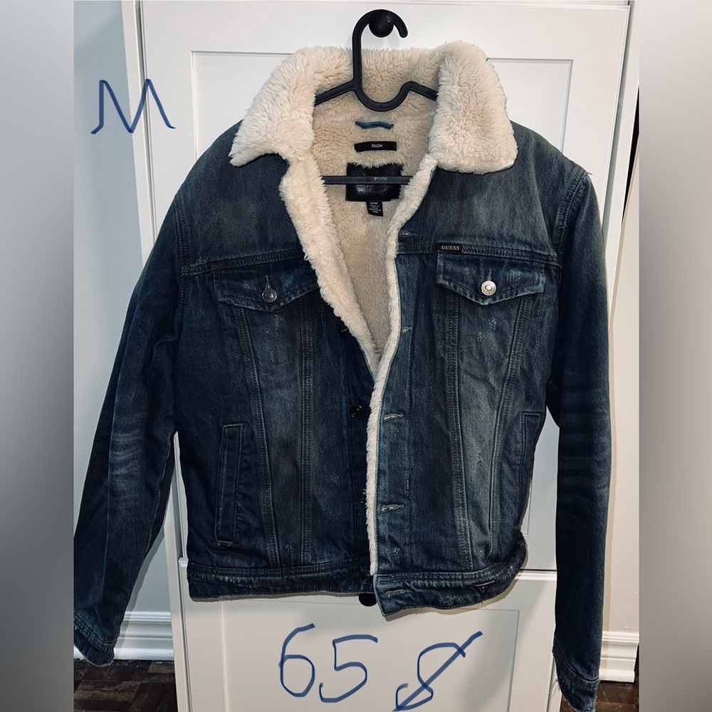 blue jeans jacket, size medium the outside and also covered in fur on the inside